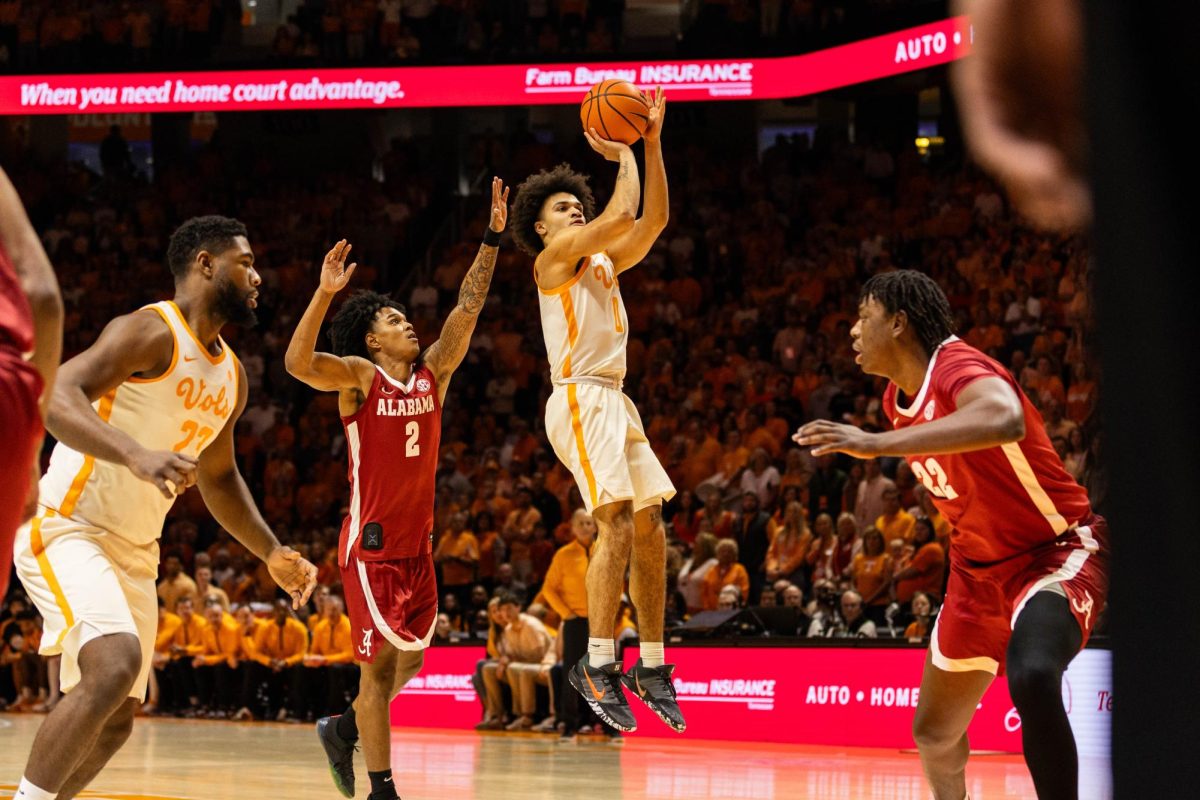 Jakobi Gillespie (0) shoots a three-point shot in a game against Alabama at Food City Center. Saturday, Feb. 28th, 2026.