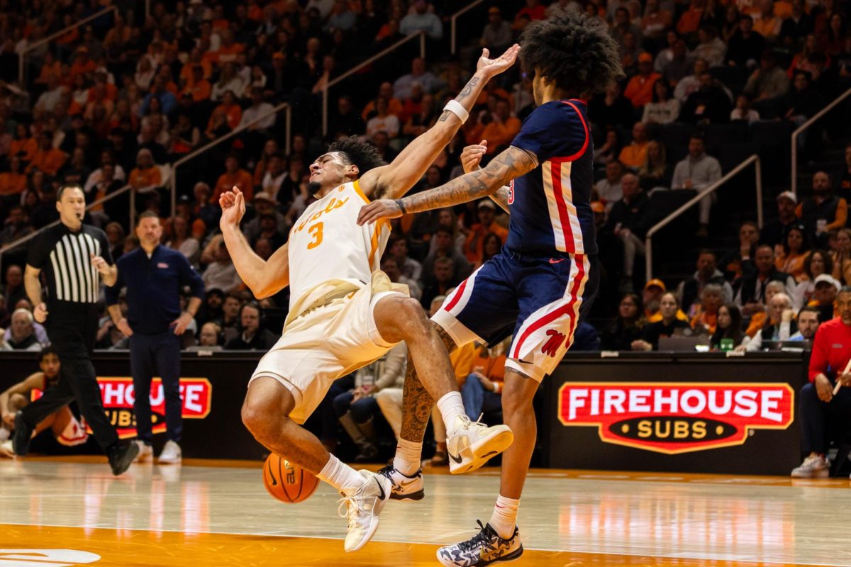 Bishop Boswell (3) falls following a push from an Ole Miss defender at Food City Center. Tuesday, February 3rd, 2026.