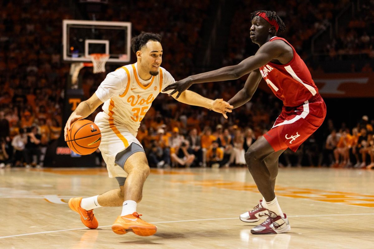 Ethan Burg (35) protects the ball from a defender in a game against Alabama at Food City Center. Saturday, Feb. 28th, 2026.