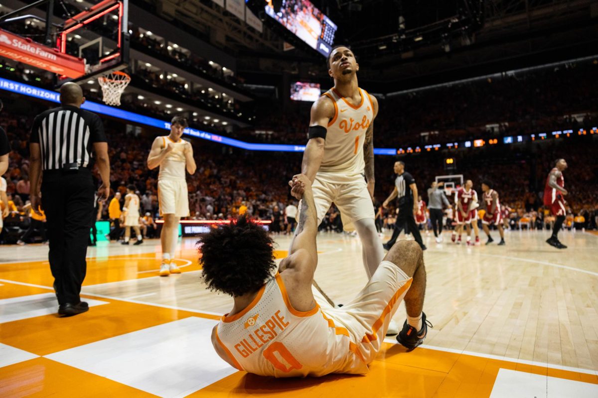 Aamri Evans (1) pulls Jakobi Gillespie (0) up off the court following a loss to Alabama at Food City Center. Saturday, Feb. 28th, 2026.