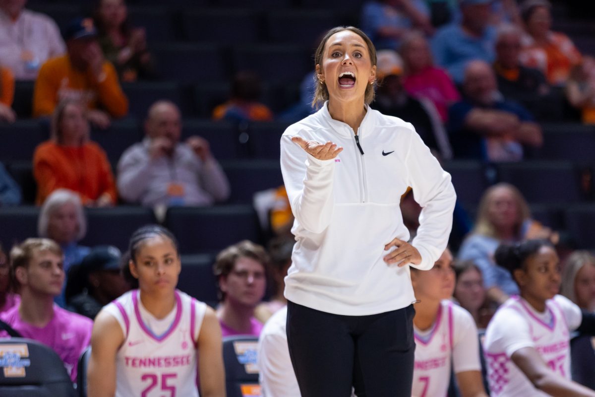 Head coach Kim Caldwell talks to a ref during a game against Texas A&amp;M at Food City Center. Thursday, Feb. 19, 2026.