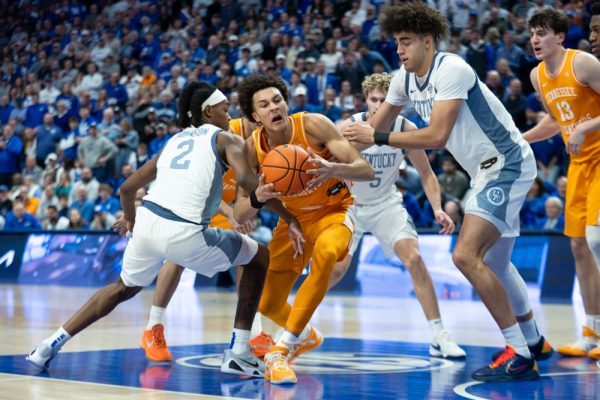 Nate Ament (10) battles under the basket during a game against Kentucky at Rupp Arena. Saturday, Feb. 7, 2026.