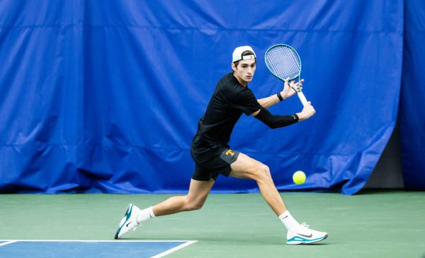Dragos Cazacu returns the ball to Eastern Kentucky in Goodfriend Tennis Center. Thursday, Jan. 29, 2026.