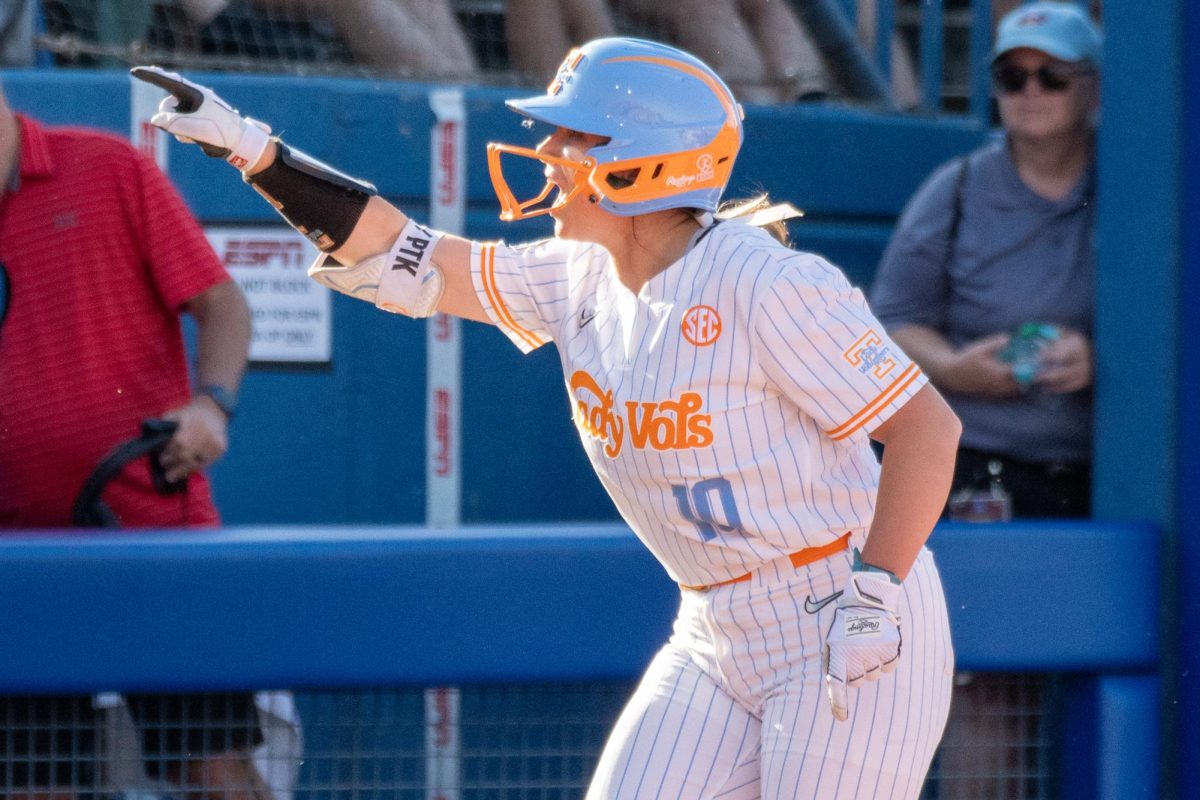 Alannah Leach (10) celebrates a bases-clearing double during an NCAA Women's College World Series game against Florida at Devon Park. Friday, May 30, 2025.