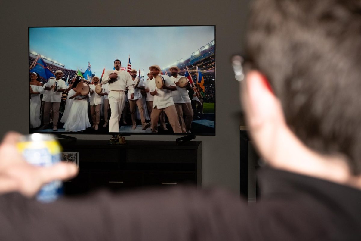 Fans watch the Super Bowl halftime show. Wednesday, Feb.18, 2026.