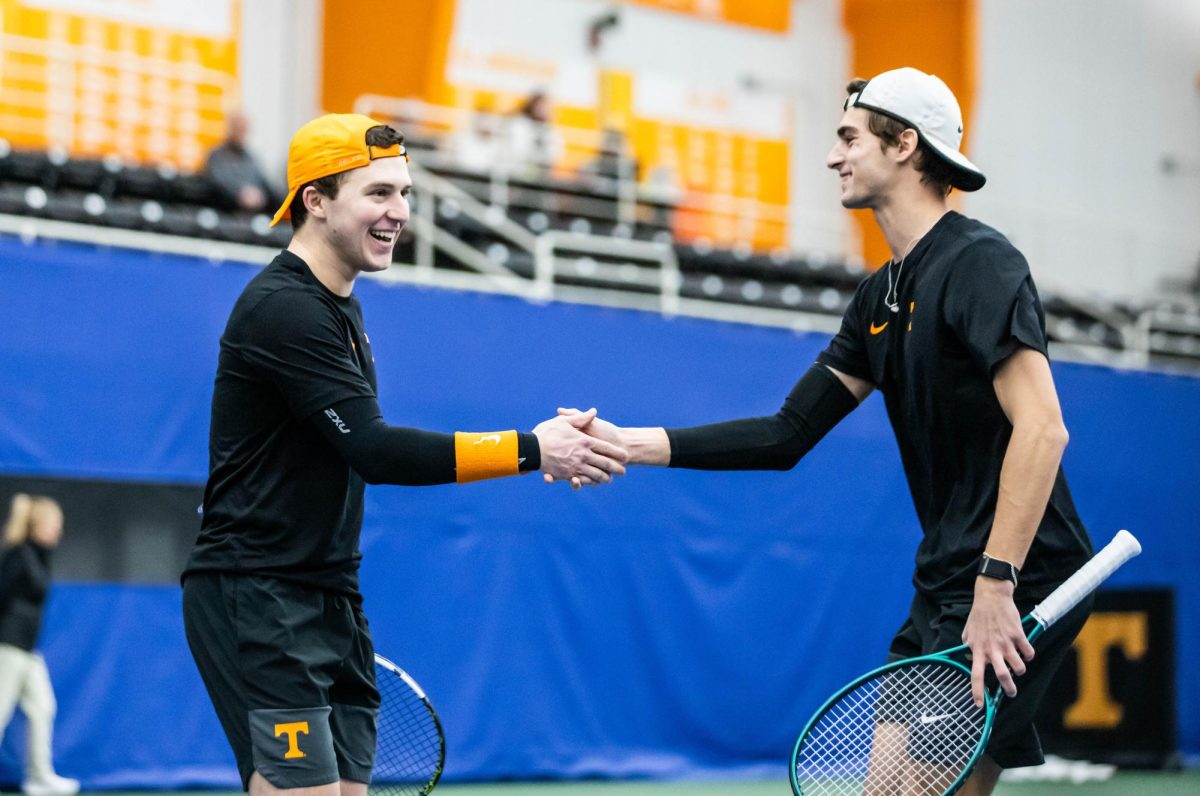 Alejandro Moreno and Dragos Cazacu celebrate during a match against Eastern Kentucky in Goodfriend Tennis Center. Thursday, Jan. 29, 2026.