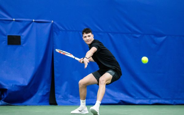 Jan Kobierski returns the ball to Eastern Kentucky in Goodfriend Tennis Center. Thursday, Jan. 29, 2026.