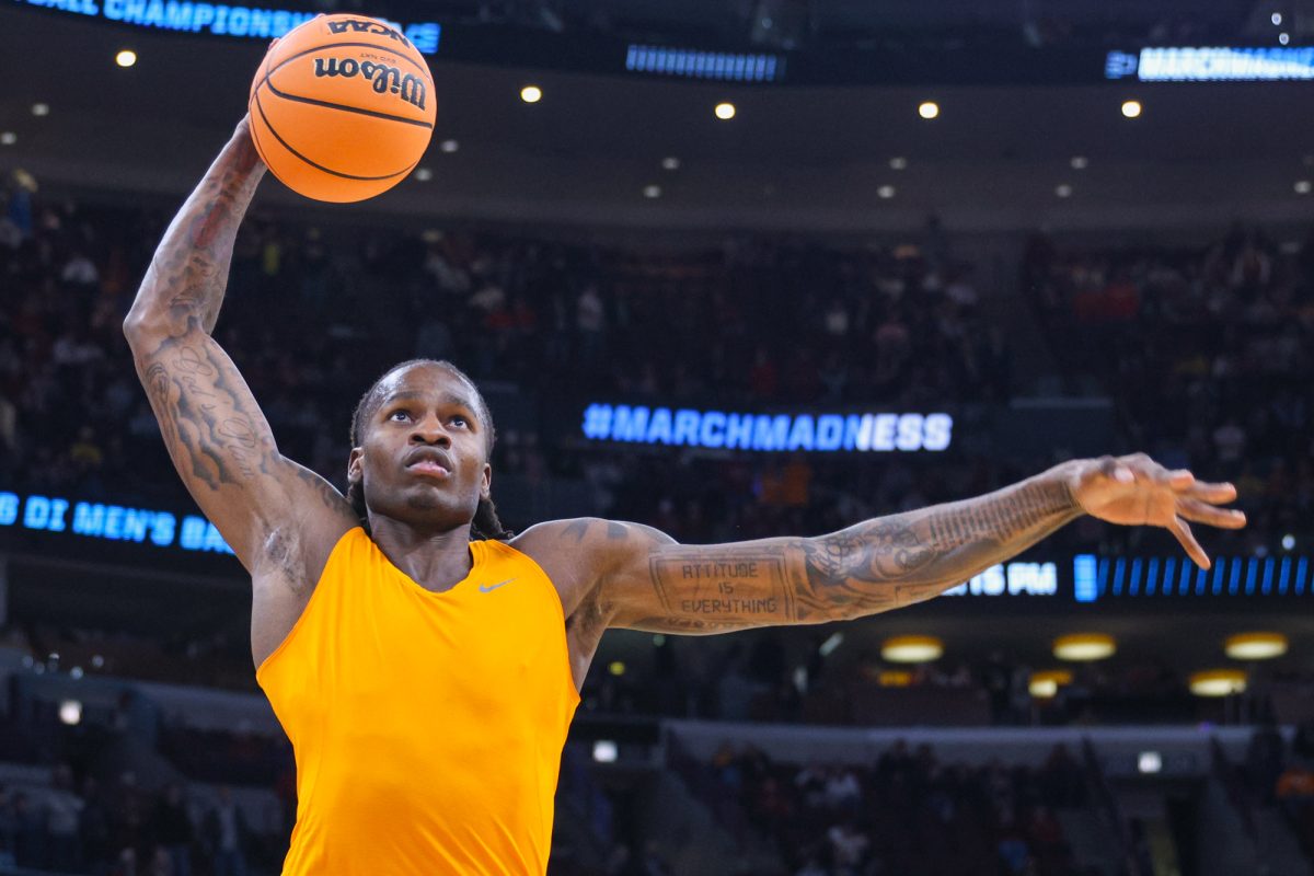 Felix Okpara (34) warms up for an NCAA Tournament game against Iowa State at United Center. Friday, March 27, 2026.
