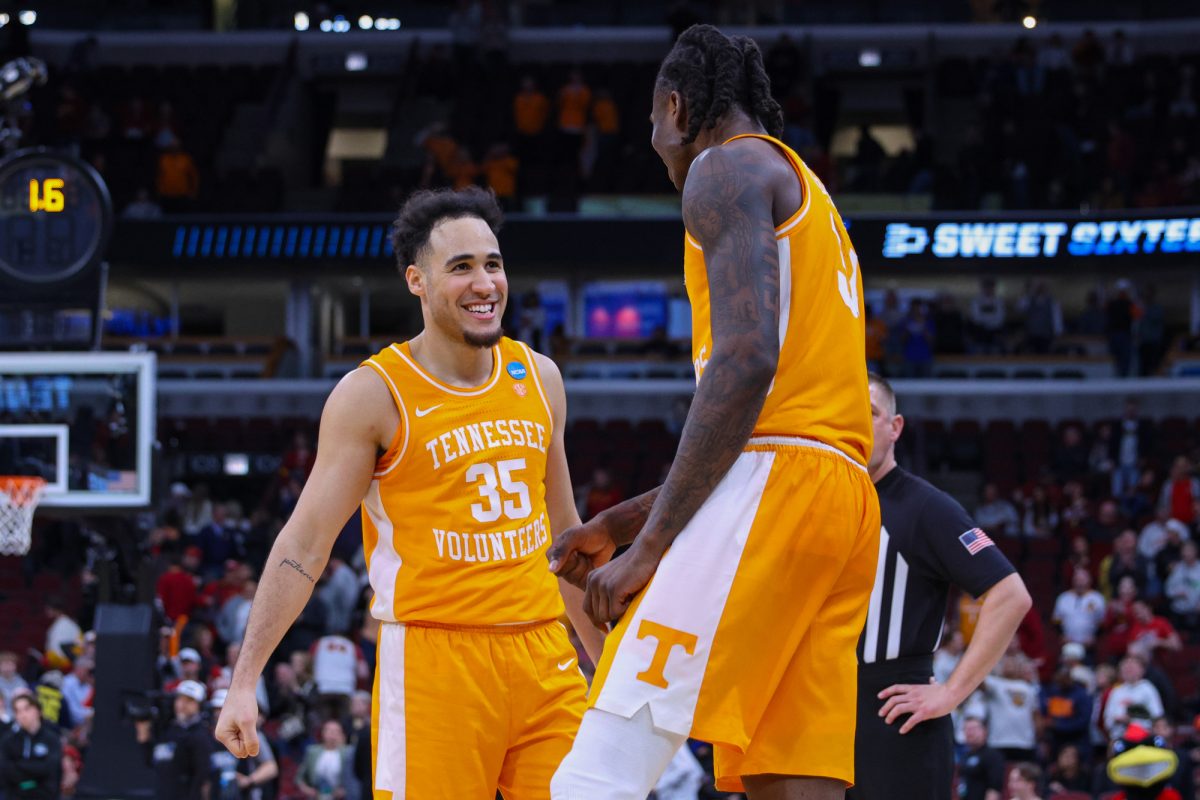 Ethan Burg (35) and Felix Okpara (34) celebrate Tennessee basketball's 76-62 win over Iowa State in the Sweet 16 at United Center. Friday, March 27, 2026.