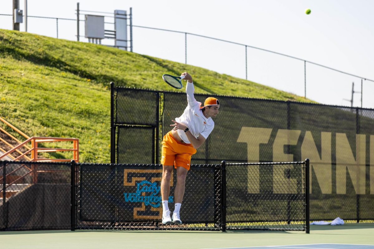 Piotr Siekanowicz serves the ball in a doubles match against Florida at Barksdale Stadium, Sunday, March 22, 2026.