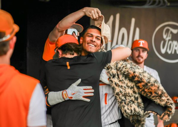 Blaine Brown (1) celebrates with teammates after hitting a home run during the game against Oakland in Lindsey Nelson Stadium. Wednesday, Mar. 4.