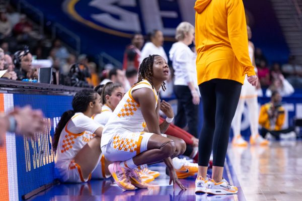 Talaysia Cooper (55) talks to head coach Kim Caldwell during an SEC Tournament game against Alabama at Bon Secours Wellness Arena. Thursday, March 5, 2026.