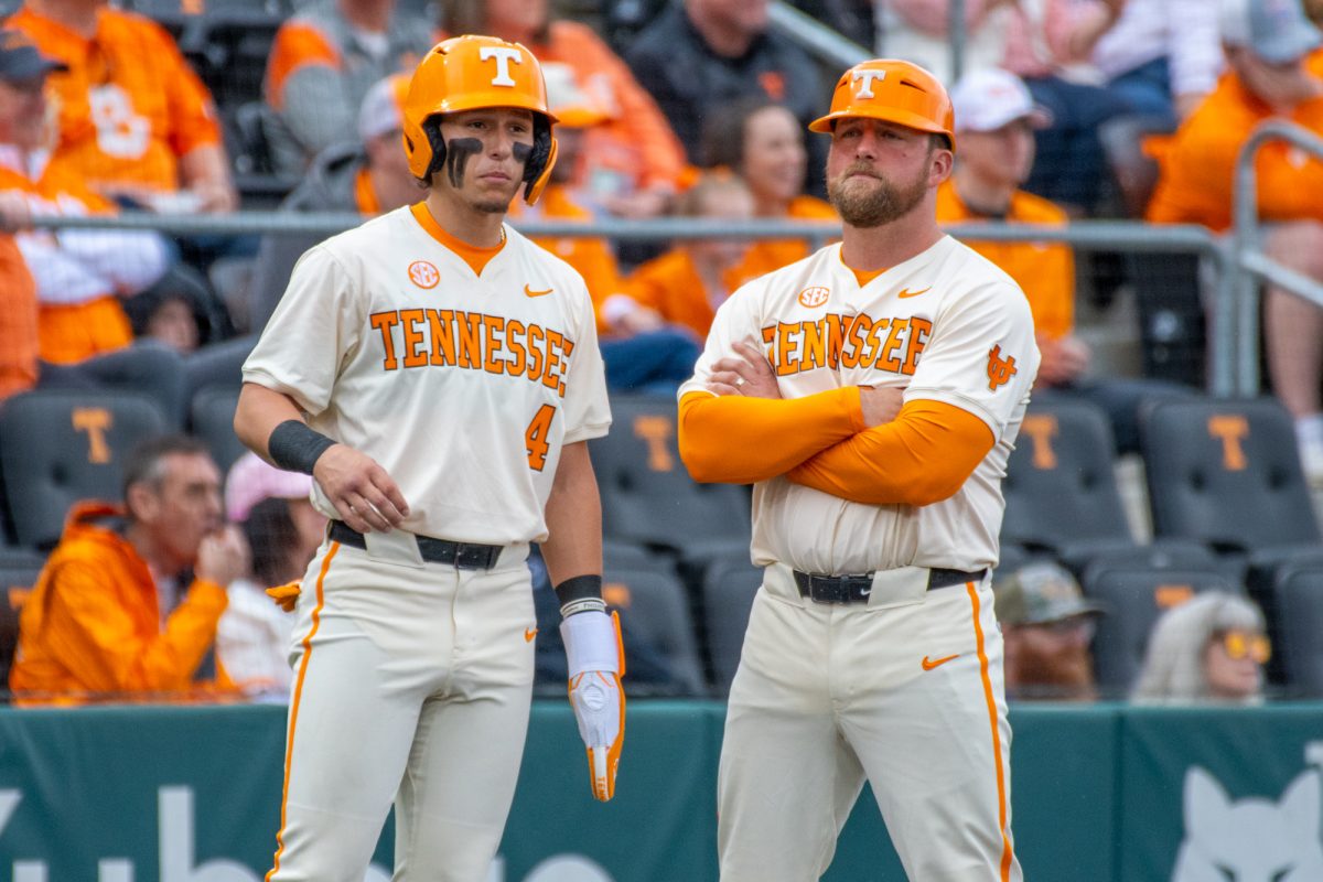 Manny Marin (4) and Josh Elander (24) talk at third base during a game against Wright State at Lindsey Nelson Stadium. Sunday, March 8, 2026.