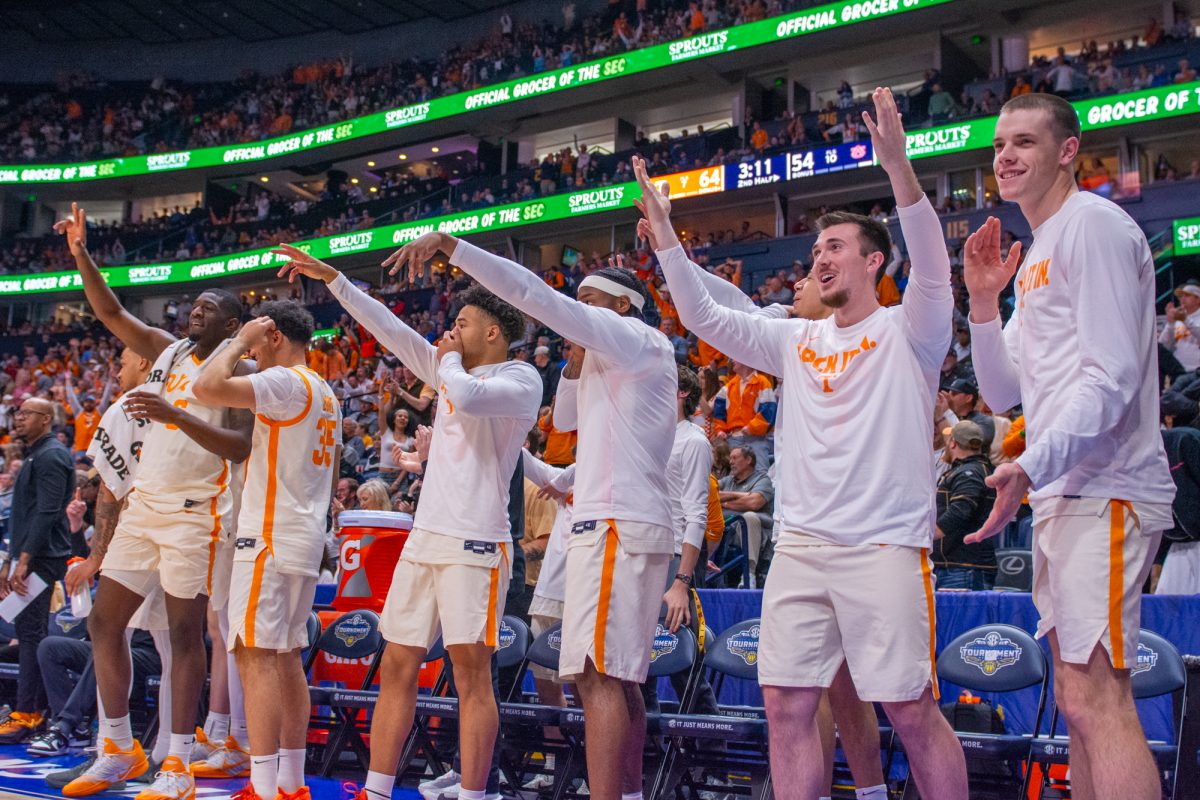 Tennessee basketball's bench celebrates a made basket during an SEC Tournament game against Auburn at Bridgestone Arena. Thursday, March 12, 2026.
