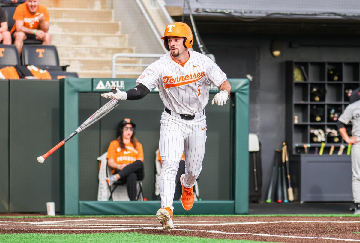 Garrett Wright (5) tosses his bat aside after getting walked during the game against Oakland in Lindsey Nelson Stadium. Wednesday, Mar. 4.