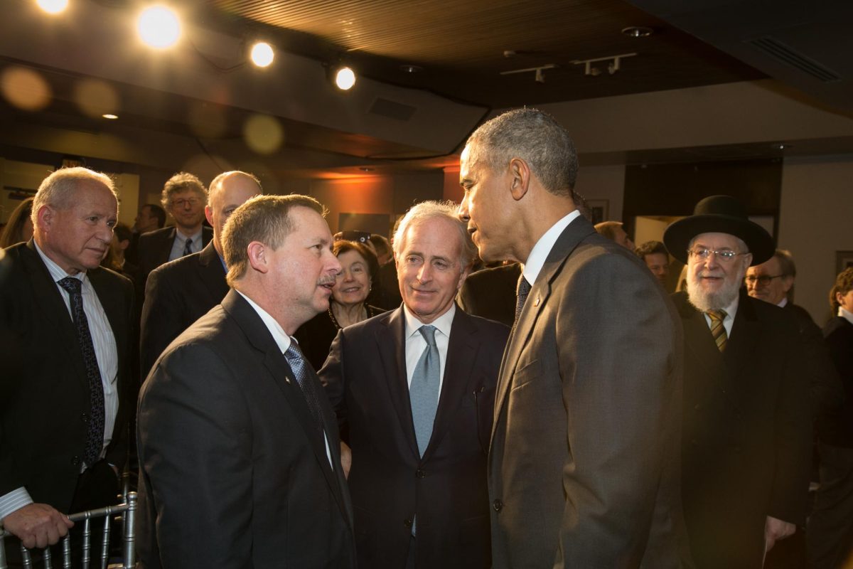 Pastor Chris Edmonds talking with President Barack Obama and Tennessee Senator Bob Corker regarding his father's bravery. Courtesy of Chris Edmonds.