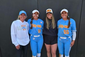 Aubrey, Alannah, Kelcy and Gabby Leach gather for a Tennessee softball game.