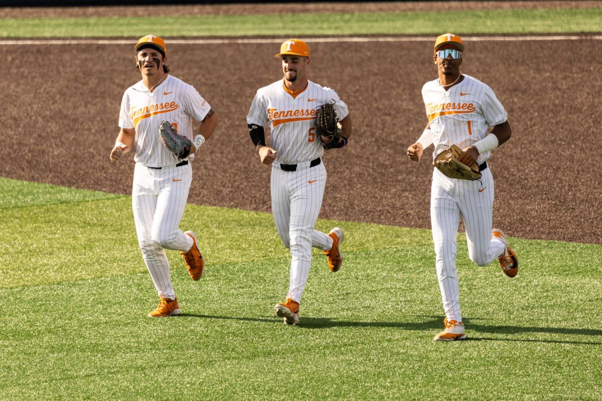 (Left to right) Reese Chapman, Garret Wright, and Blaine Brown run to the outfield before a game against Lipscomb at Lindsey Nelson Stadium, Wednesday, April 21, 2026.