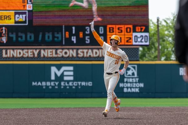 Blake Grimmer (14) hits a home run during a game against Ole Miss at Lindsey Nelson Stadium. Sunday, April 19, 2026.