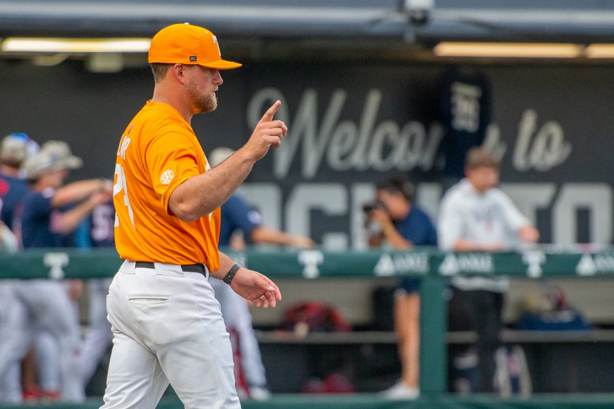 Tennessee baseball head coach Josh Elander (24) makes a pitching change during a game against Ole Miss at Lindsey Nelson Stadium. Saturday, April 18, 2026.
