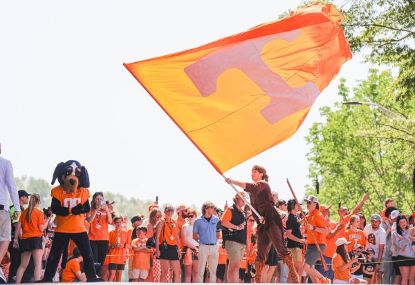 Davy Crockett waves the Power T flag during the Vol Walk before the Orange and White football game in Neyland Stadium. Saturday, Apr. 11, 2026.