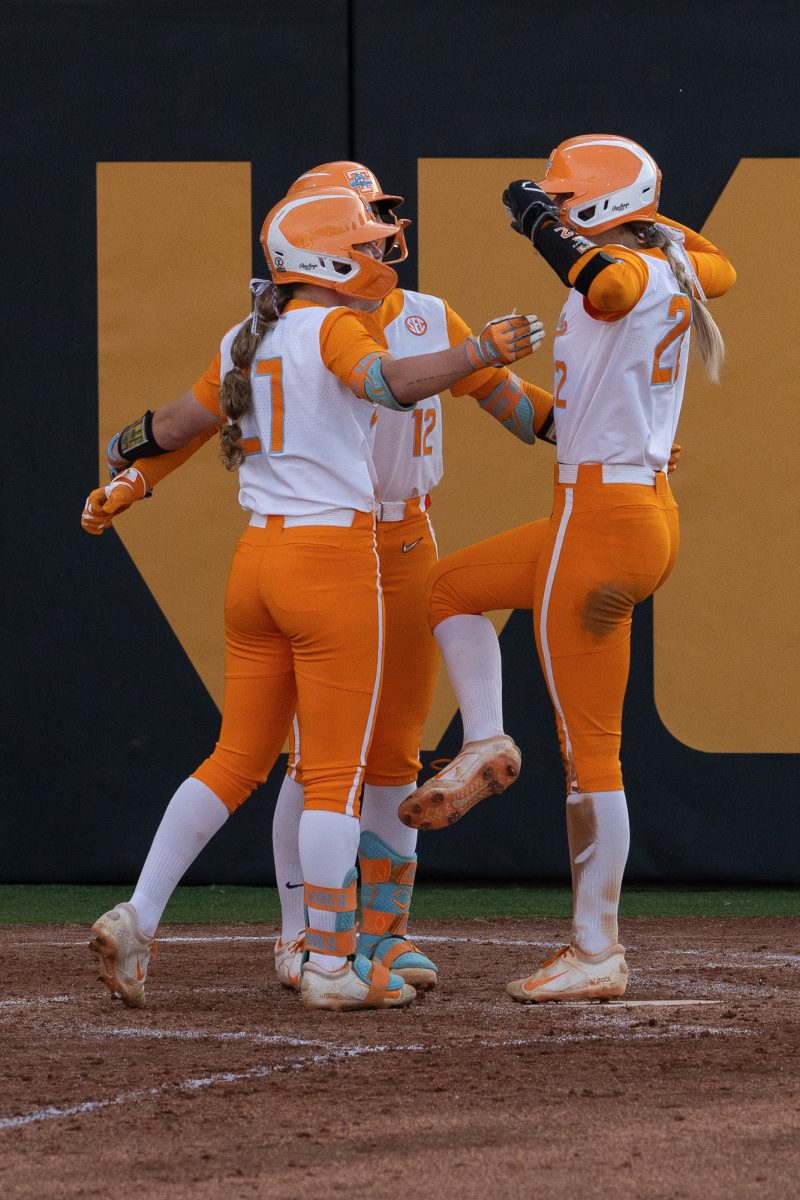 Elsa Morrison (22) is greeted at home plate by teammates after hitting a home run against Northern Kentucky during the NCAA Regionals at Sherri Parker Lee Stadium. Friday, May 15, 2026.