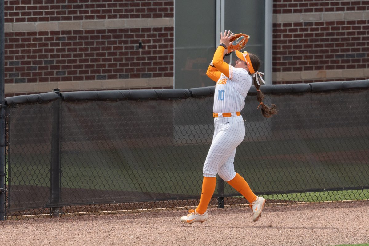 Alannah Leach (10) makes the catch against the bullpen for an out  against Virginia in the NCAA Regionals at Sherri Parker Lee Stadium. Saturday, May 16, 2026.