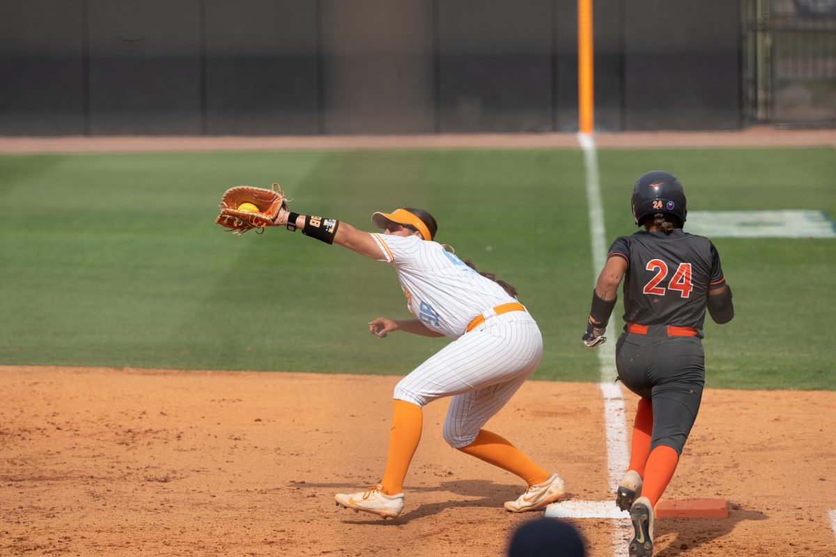 Makenzie Butt (98) gets the force out at first base against Virginia in the NCAA Regionals at Sherri Parker Lee Stadium. Saturday, May 16, 2026.