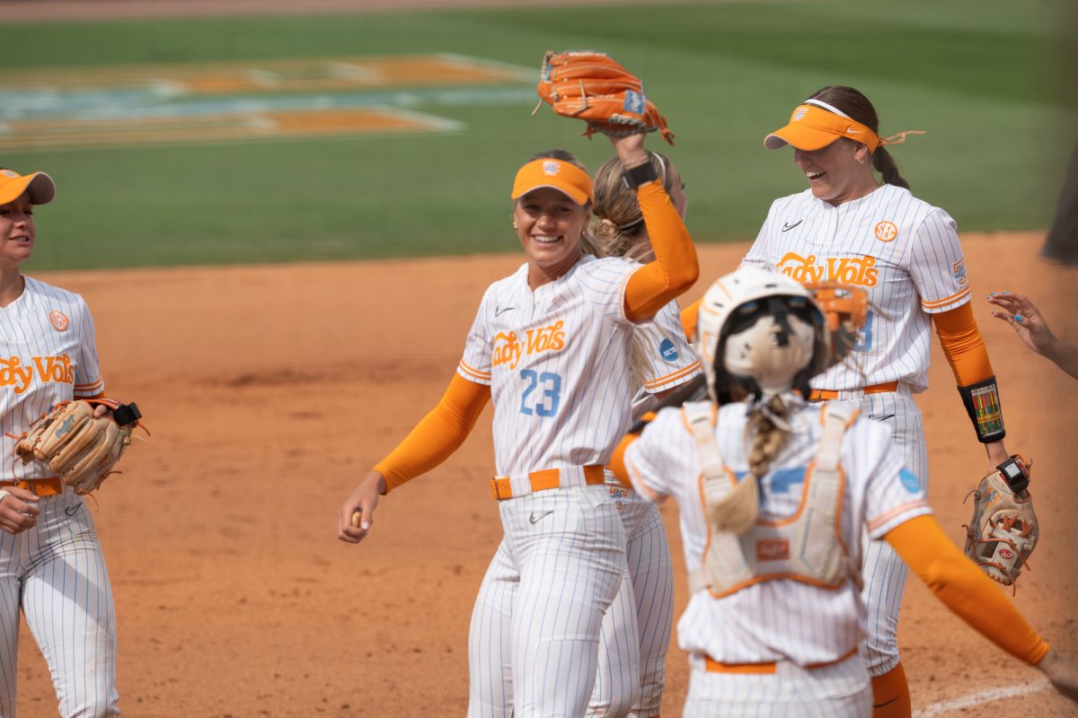 Karlyn Pickens (23) celebrates with teammates after beating Virginia in the NCAA Regionals at Sherri Parker Lee Stadium. Saturday, May 16, 2026.