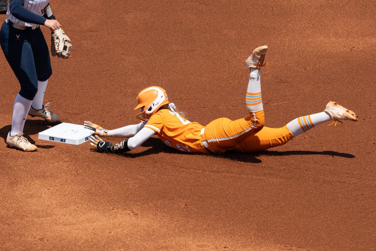 Elsa Morrison (22) steals second base off a wild pitch by Virginia in the NCAA Regionals at Sherri Parker Lee Stadium. Sunday, May 17, 2026.