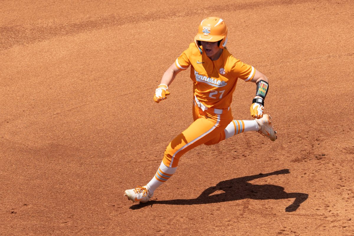 Taelyn Holley (27) sprint to third after a wild pitch by Virginia in the NCAA Regionals at Sherri Parker Lee Stadium. Sunday, May 17, 2026.