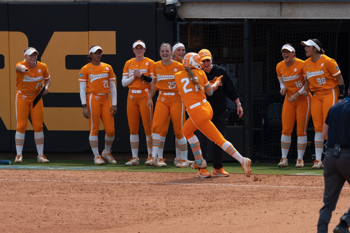 The Lady Vols celebrate Taelyn Holley's (27) home run against Virginia in the NCAA Regionals at Sherri Parker Lee Stadium. Sunday, May 17, 2026.