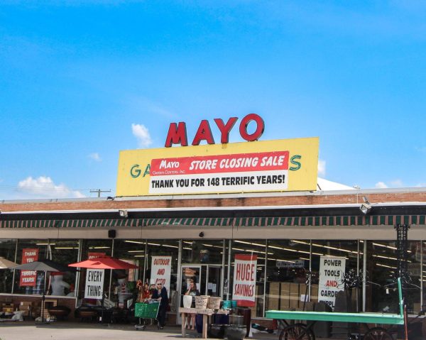 Mayo Garden Center storefront featuring closing sale sign.
