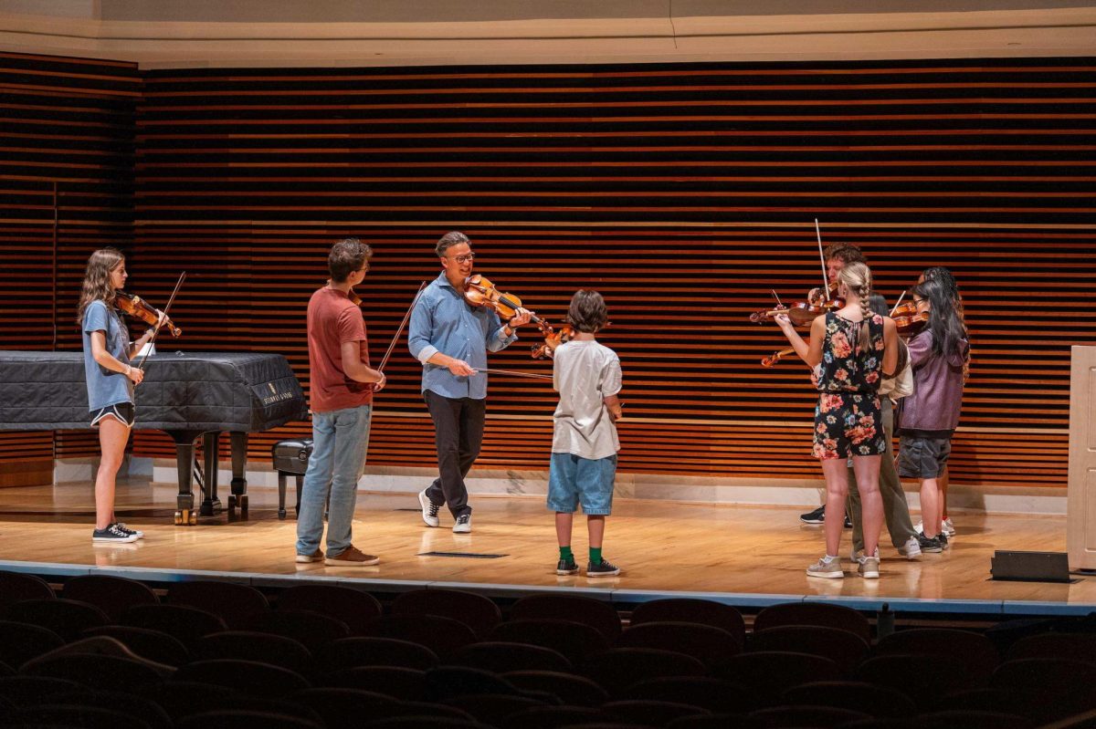 Ursus String Camp members perform.